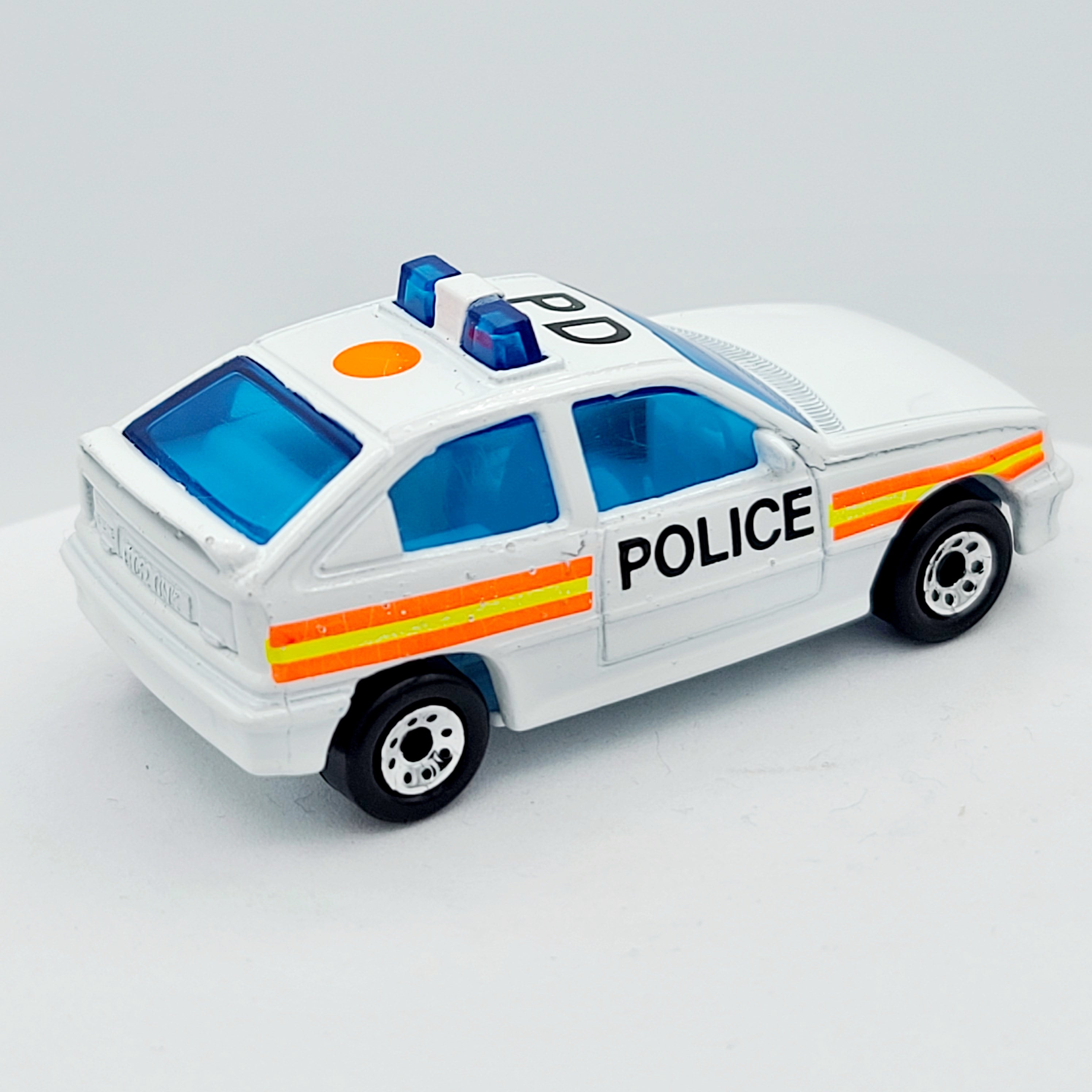 Matchbox Vauxhall Astra / Opel Kadett Police - orange dot variant (1992 - 1996 MBX International 1-75 ROW)